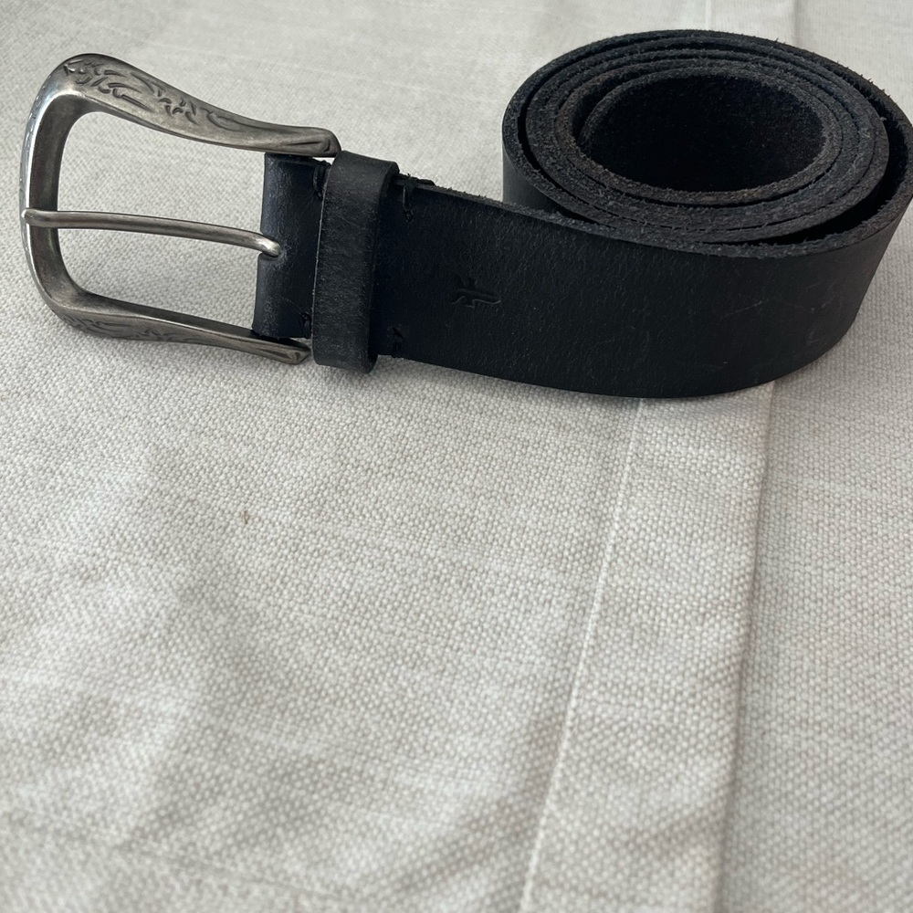 Black FRYE belt. Genuine leather. Worn handful times. Large. Fits true to size.